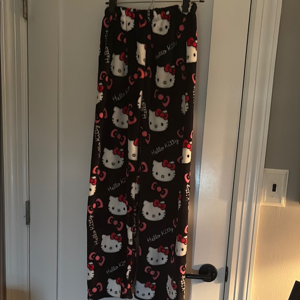 Hello Kitty Black and White Fleece pants. Asian XL. Runs small in waist. NWOT.